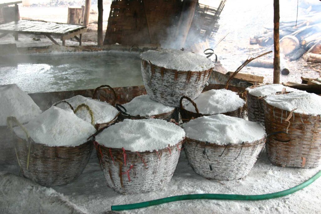 Traditional woven salt bags filled with white salt.