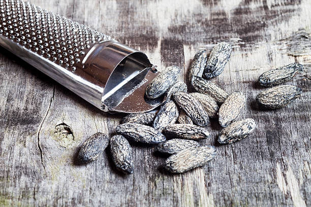Tonka beans on a wooden table